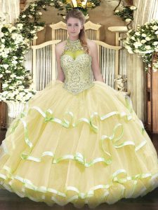 Deluxe Light Yellow Organza and Tulle Lace Up Halter Top Sleeveless Floor Length Sweet 16 Dresses Beading and Ruffled Layers
