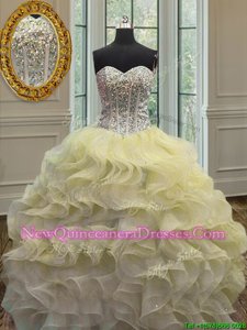 Colorful Light Yellow Sweetheart Neckline Beading and Ruffles Quinceanera Gowns Sleeveless Lace Up